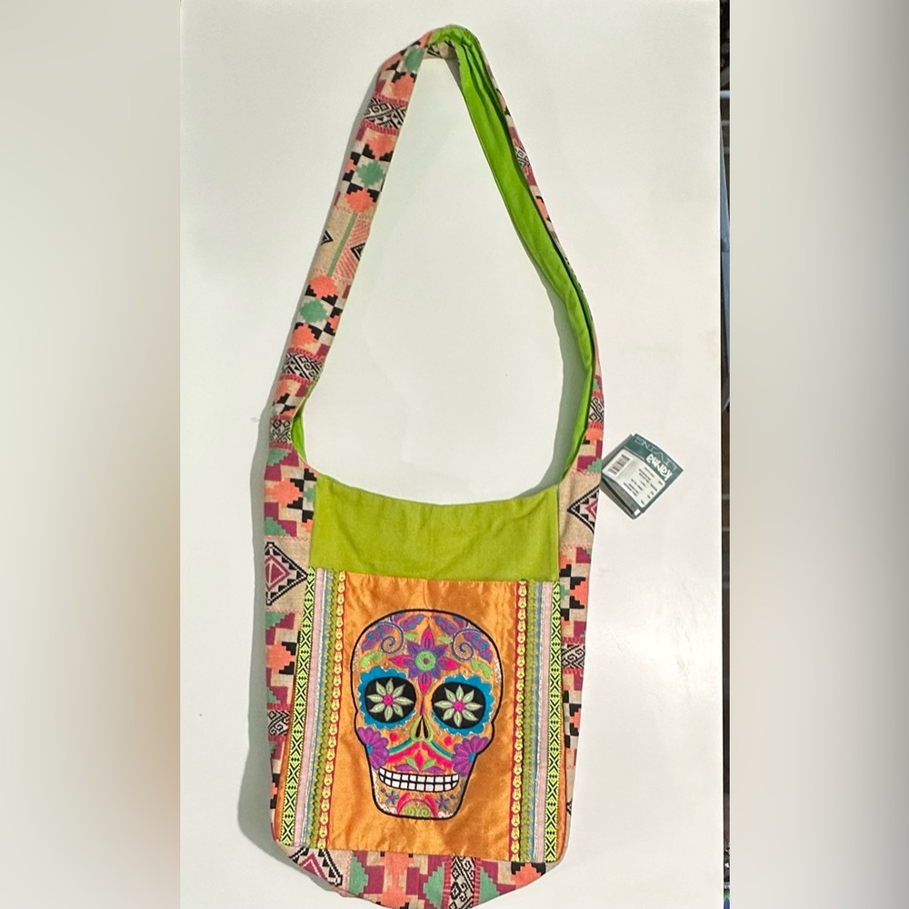 Karma living skull shoulder bag